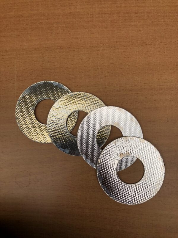 Beispiel laserschneiden auf Eurolaser mit Gewebeverbund mit Alufolie beschichtet – Bild 1